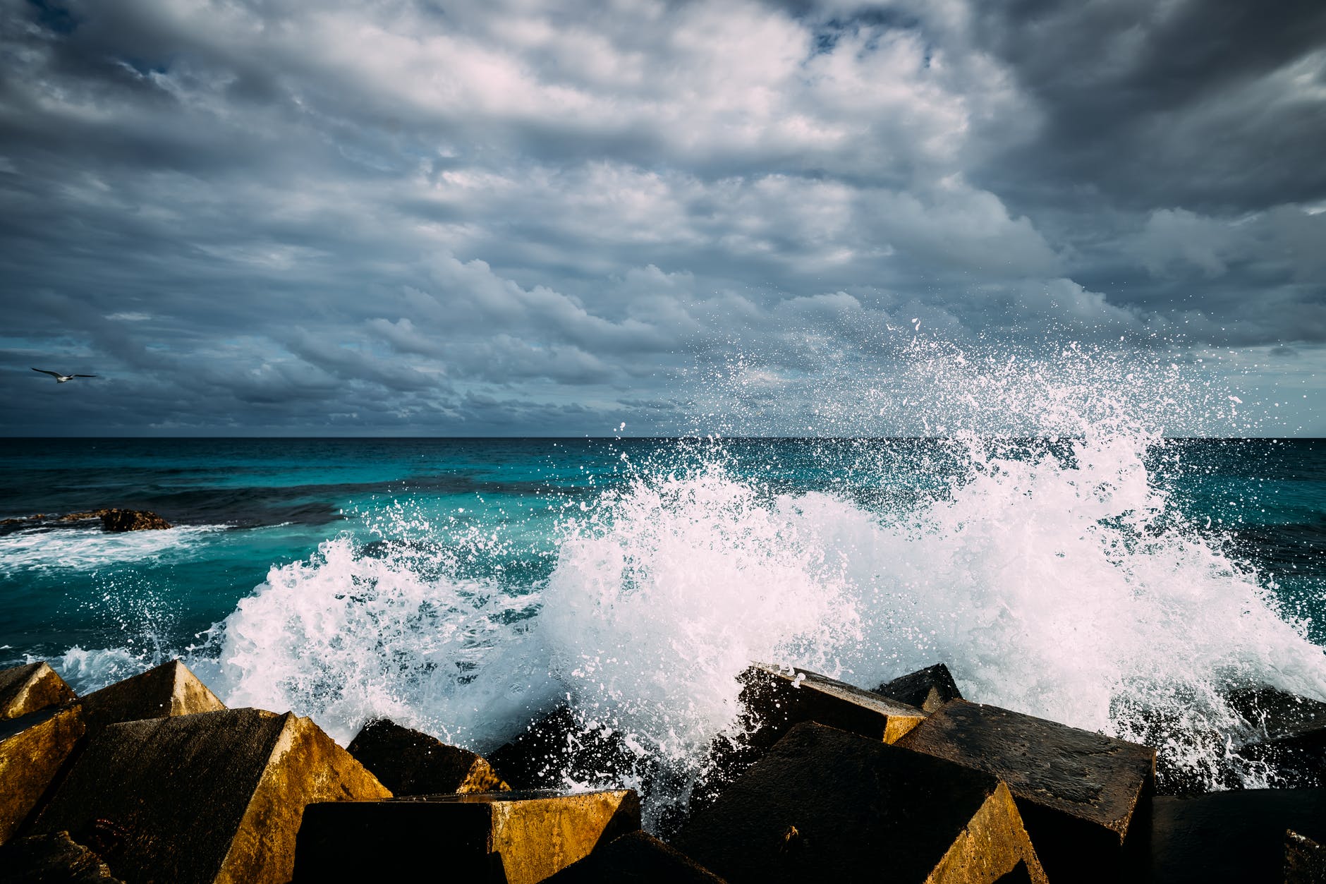 crash foam ocean rocks